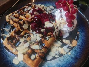 Belgian waffles with cherry at Mono Cafe in Munich