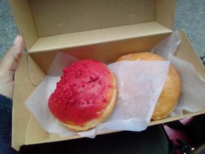 The raspberry filled donut was so good....bees were attracted to it too at Sammy's Berliner Donuts in Berlin