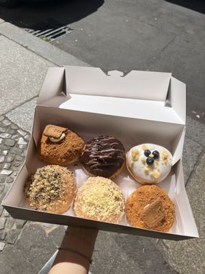  Lotus, chocolate, vanille blueberry, duo, vanille and another lotus 🍩  at Sammy's Berliner Donuts in Berlin