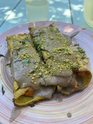 Canelones de calabaza y choclo con salsa de hongos (Menú del día)  at Inhala Bar Natural in Funes
