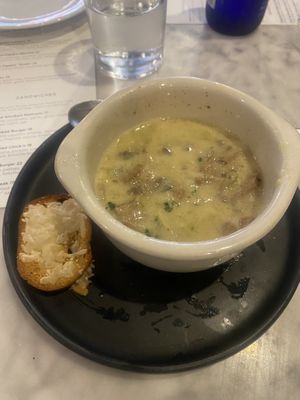 Clam chowder half-eaten. Really really good   at Willow Vegan Bistro in New York City