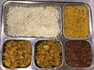 Thali plate - four curries of the day with rice  at Mouza  in Bellingen