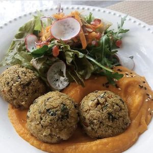 Quinoa balls with sweet potato purée  at Café Com Calma in Lisbon