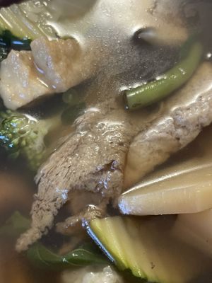 Pho with seitan and tofu plus herbs and noodles on the side   at Nam in Cologne