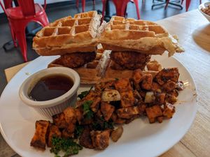 Chik'n and waffles w/ breakfast potatoes (Vegan) at Spacecat V-stro in Ferndale