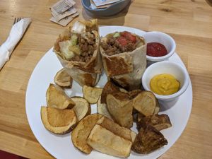 Cheeseburger burrito with cosmic fries at Spacecat V-stro in Ferndale