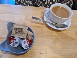 Coffee with oat milk & raw cane sugar at Spacecat V-stro in Ferndale