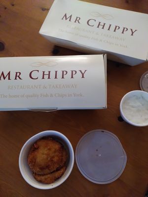 Hash browns and tartare sauce with Mr Chippy box at Mr Chippy in York