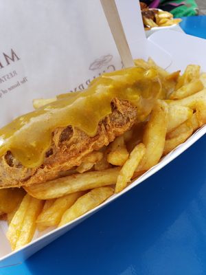 Vegan sausage, chips and curry sauce! at Mr Chippy in York