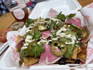 Amazing nachos with watermelon radish and jalapeños! at Taco Vega in Los Angeles