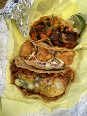 Top to bottom: asada, Baja, and Al pastor *chefs kiss*  at Taco Vega in Los Angeles