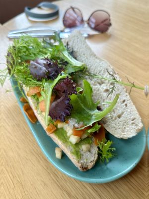 Sandwich with mashed peas and smoked carrotts  at Superkelly in Ghent