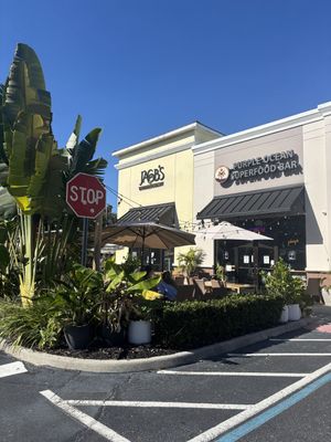 cute outside seating area   at Purple Ocean Superfood Bar in Orlando
