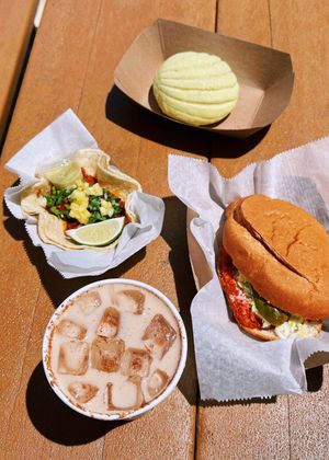 Weekend special: hot chicken torta, matcha concha, horchata, al pastor taco. at Succulent Vegan Tacos in Nashville