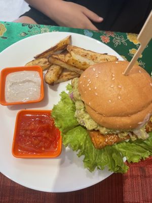 Tempeh burger with air fried fries   at Reach Plant Based Kitchen in Phuket