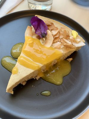 Coconut and mango cheesecake at Nato Comé Real in Rosario