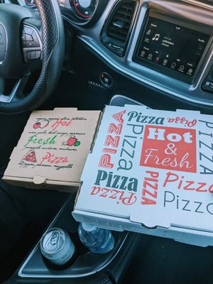 The kids pizza next to the regular size pizza. at Fatty Vegan in Ventura