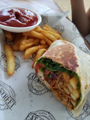 Vegan burrito with fried at Eat Street in Santa Teresa