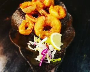 Onion Bhaji - Roughly cut onions dipped in spiced chickpea flour at 3 Brothersss in Melbourne