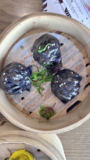Black garlic and mushroom dumplinggs  at east in Auckland