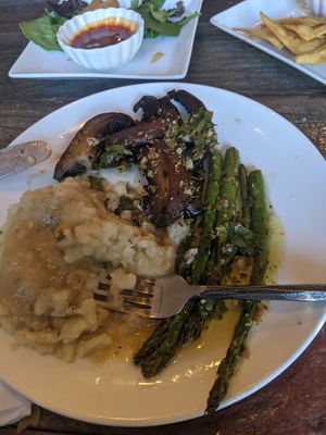 Chimichurri mushroom steak with potatoes and asparagus at Sky Cafe in South San Francisco