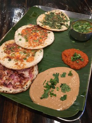 Set Uthappam South Indian Tiffin. 4 different mini uthappams (a thicker dosa with toppings) served with chutneys. Fantastic. at Kumar's Minneapolis in Apple Valley