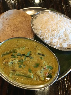 Avial Curry (Kerala coconut curry with fresh veggies & moringa). Good overall but I did not care for the asparagus. Side of Chapahti (grilled whole wheat tortilla-like bread) at Kumar's Minneapolis in Apple Valley