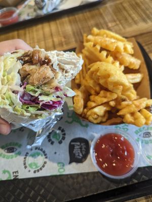 Doner wrap and waffle fries at What The Pitta in Manchester