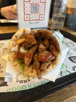 Doner gyros (soya pieces in a pitta with salad, fries and tzatziki).  at What The Pitta in Manchester
