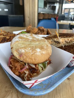 BBQ sandwich in the front at Beaut Burger in Phoenix