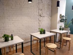 Indoor seating at SITE x supernature in East London