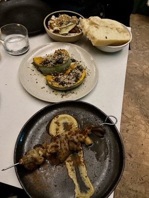 pumpkin, roasted potatoes, oyster mushroom kebab and focaccia at SITE x supernature in East London