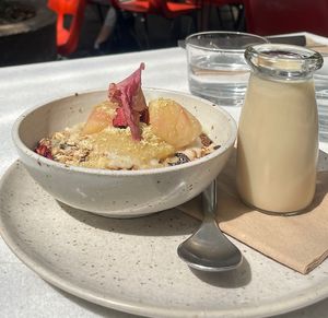 Granola and poached pears  at SITE x supernature in East London