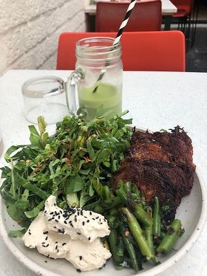 Beet fritters with greens and cashew cream at SITE x supernature in East London