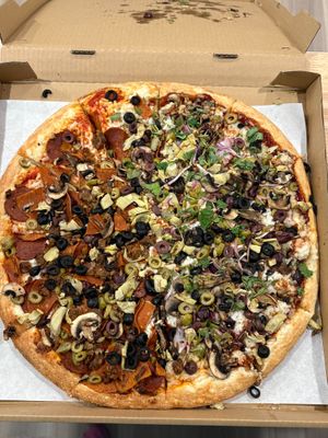 Half Vegan BBQ Chicken pizza and Vegan All Meat pizza

 at Papa Pizza Pie in Fullerton