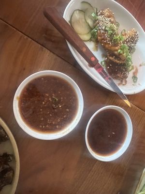 Sesame wings and their side sauces  at Minty Z in Coconut Grove