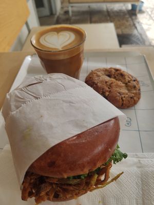 Crispy leek sandwich, chocolate chip and olive oil cookie, and almond milk cappuccino :) at Mela - Old North in Tel Aviv