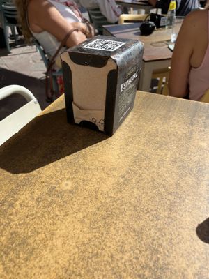 Outside table with qr menu #Veganuary at Bliss Café in Tenerife