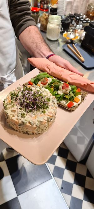 Raw vegan salad with peas, carrots, apples, pickles, a mix of green salads, cashews at Zdravo Ljubavi in Belgrade