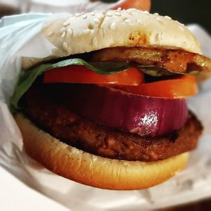 Massaman burger. Burger with fried potato and vburger peanut massaman sauce. at VBurger in Bangkok