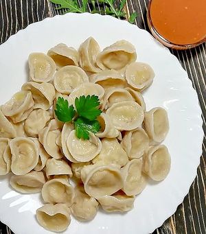 Russian pelmeni (dumplings) with chickpea and lentil mince. at Krapiva Food in Novosibirsk