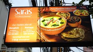 Handy sign, as restaurant set back from the road. at Saras in Bangkok