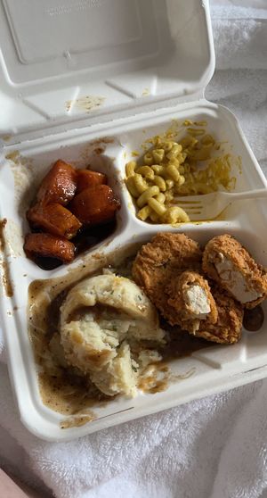 souther fried chicken with candied yams, mac & cheese, & mashed potatoes with gravy at Binge Kitchen in Austin