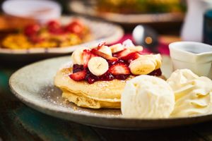 Vegan Pancake Stack, served with a vegan ice cream, vegan cream & Maple  at Claudia Road Cafe in Toongabbie