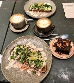 Avocado toast and cauliflower brownie  at Honest Greens - Born in Barcelona