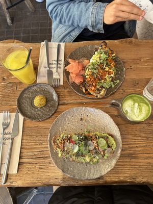 Vegan avo toast and eggs Benedict (not vegan)   at Honest Greens - Born in Barcelona