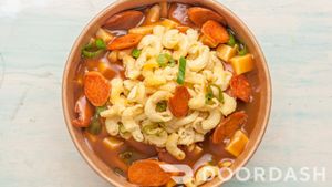 Poutine Maco Saucisse at La Boite Végane in Montreal