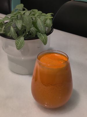 "Sol" fresh juice - orange, carrot, lemon and ginger at Savta in Barcelona