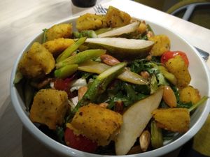 Warm salad with fried polenta cubes, rated almonds, asparagus, pears at VHY! in Stuttgart