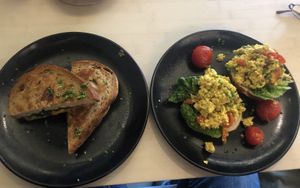 Grilled cheese sandwich with spinach, scrambled tofu on Laugenbrötchen at VHY! in Stuttgart
